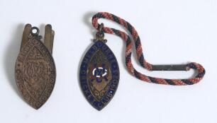 Early &lsquo;Melbourne Cricket Ground&rsquo; membership medals for 1902-03. Made by J.R. Gaunt & Sons, London. One medal lacking the colour enamel decoration, the other with the colour enamel. The un-enamelled medal with clip added presumably to clip to jacket/tie??.