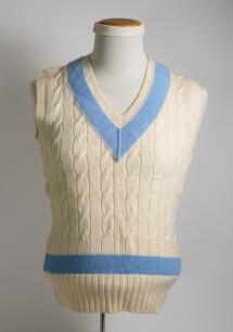 Robert William &lsquo;Bob&rsquo; Taylor. Derbyshire & England 1961-1988. World XI Team international sleeveless sweater worn by Taylor whilst playing for the World XI in Australia in 1971/72. The sweater, by Jaeger&rsquo;, with world XI light blue trimming to waist and che
