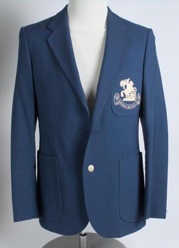 Robert William &lsquo;Bob&rsquo; Taylor. Derbyshire & England 1961-1988. M.C.C. mid blue touring blazer, by Burton, worn by Taylor on the M.C.C. tour of Australia and New Zealand in 1982/83. The blazer with embroidered M.C.C. emblem in white of St George & Dragon of 