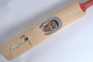 &lsquo;Brian Lara. 501 not out&rsquo;. Full size unbranded cricket bat assumed to have been produced to commemorate Brian Lara&rsquo;s record individual score of 501no for Warwickshire v Durham at Edgbaston 1994. The bat face features a hand painted head and shoulders colo