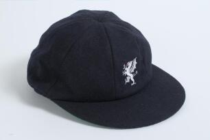 Andrew Hayhurst. Somerset 1990-1996. Somerset navy blue county 1st XI cricket cap with county emblem to front issued to Hayhurst in his playing career. Cap by Dege of Savile Row. The cap was previously sold by Knights in 2000. Very good condition, appears
