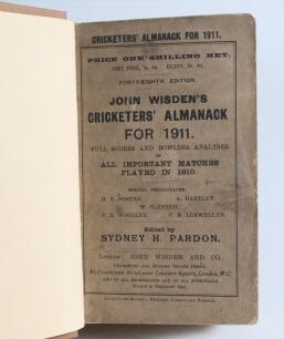 Wisden Cricketers&rsquo; Almanack 1911 & 1912. 48th & 49th editions. Bound in light brown boards, with original paper wrappers, gilt titles to spine. Some browning and minor wear to wrappers of both editions, in addition some soiling and old tape marks to the w