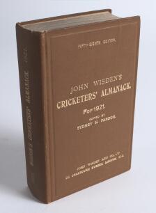Wisden Cricketers&rsquo; Almanack 1921. Original hardback. 58th edition. Minor vertical crease to the top right hand corner of the front board, some loss of yellow surface to the lower right hand border of the inside front board where a label has been removed o