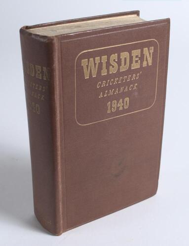 Wisden Cricketers&rsquo; Almanack 1940. 77th edition. Original hardback. Limited number of copies printed in this war year. Marks to front board, some general wear to boards, wear to front internal hinge otherwise in good/very good condition. A rare wartime edi