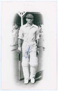 Cyril Turner. Yorkshire 1925-1946. Mono real photograph plain back postcard of Turner in cameo, full length walking out to bat at Scarborough. Nicely signed in blue ink by Turner to the photograph. Official stamp to verso for Walkers Studios, Scarborough.
