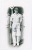 Cyril Turner. Yorkshire 1925-1946. Mono real photograph plain back postcard of Turner in cameo, full length walking out to bat at Scarborough. Nicely signed in blue ink by Turner to the photograph. Official stamp to verso for Walkers Studios, Scarborough.