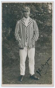 John Lindsay &lsquo;Jack&rsquo; Bryan. Kent & Cambridge University 1919-1932. Sepia real photograph postcard of Bryan standing full length, wearing striped blazer and Kent cap. Nicely signed in ink to the photograph by Bryan. Publisher unknown. Postally unused. An ex
