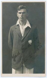 Alan Edward Watt. Kent 1929-1939. Sepia real photograph postcard of Watt standing three quarter length wearing cricket attire and Kent blazer. Signed in ink to the darker part of the photograph by Watt. B. & W. Fisk-Moore of Canterbury. Postally unused. S