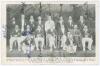 M.C.C. tour to India 1933/34. Mono postcard of the M.C.C. touring party seated and standing in rows wearing cricket attire and tour blazers. Fully signed in ink by the sixteen featured members of the M.C.C. touring party. Signatures are Jardine (Captain),