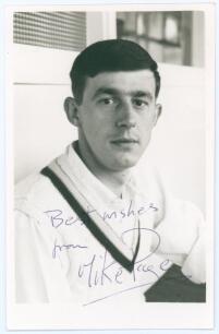 Michael Harry &lsquo;Mike&rsquo; Page. Derbyshire 1964-1939. Mono real photograph plain back postcard of Page, head and shoulders wearing cricket attire. Signed in blue ink to the photograph by Page. Official stamp to verso for A. Wilkes & Son, West Bromwich. Postall