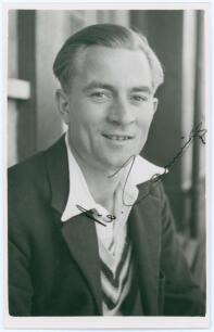Victor Henry Douglas &lsquo;Vic&rsquo; Cannings. Warwickshire & Hampshire 1947-1959. Mono real photograph plain back postcard of Cannings, head and shoulders wearing cricket attire and blazer. Nicely signed in ink to the photograph by Cannings. Official stamp to vers