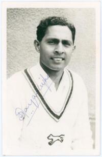 Stanley Jayasinghe. Leicestershire 1961-1965. Mono real photograph plain back postcard of Jayasinghe, head and shoulders wearing cricket attire. Nicely signed in blue ink to the photograph by Jayasinghe. Official stamp to verso for A. Wilkes & Son, West B