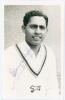 Stanley Jayasinghe. Leicestershire 1961-1965. Mono real photograph plain back postcard of Jayasinghe, head and shoulders wearing cricket attire. Nicely signed in blue ink to the photograph by Jayasinghe. Official stamp to verso for A. Wilkes & Son, West B