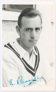 William Eric Russell. Middlesex & England 1956-1972. Mono real photograph plain back postcard of Russell, head and shoulders wearing cricket attire. Nicely signed in blue ink to the photograph by Russell. Official stamp to verso for A. Wilkes & Son, West 
