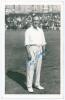 Percy Holmes. Yorkshire & England 1913-1933. Mono real photograph plain back postcard of Holmes standing full length on the outfield at Scarborough wearing cricket attire. Nicely signed in blue ink to the photograph by Holmes. Official stamp to verso for 