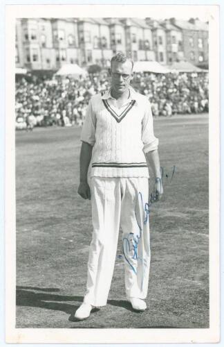 William Eric &lsquo;Bill&rsquo; Bowes. Yorkshire & England 1928-1947. Mono real photograph plain back postcard of Bowes standing full length on the outfield at Scarborough wearing cricket attire. Signed in blue ink to the photograph by Bowes. Date annotated to verso 