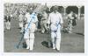Yorkshire. Herbert Sutcliffe and Len Hutton. Mono real photograph plain back postcard of Sutcliffe and Hutton walking out to bat at Scarborough. Nicely signed in blue ink to the photograph by both Sutcliffe and Hutton. Date annotated to verso 1937. Appear