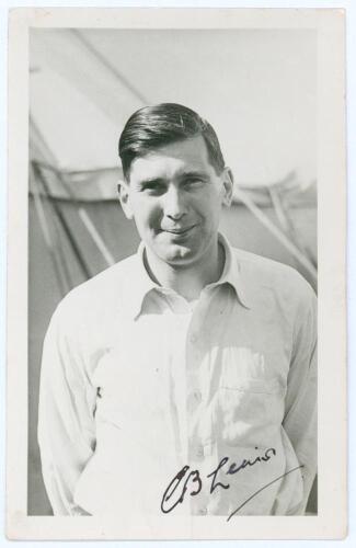 Esmond Burman Lewis. Warwickshire 1949-1958. Mono real photograph plain back postcard of Lewis, half length wearing cricket attire, at Scarborough with a marquee in the background. Nicely signed in ink to the photograph by Lewis. Date annotated to verso 1