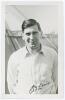 Esmond Burman Lewis. Warwickshire 1949-1958. Mono real photograph plain back postcard of Lewis, half length wearing cricket attire, at Scarborough with a marquee in the background. Nicely signed in ink to the photograph by Lewis. Date annotated to verso 1