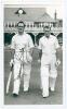 Dennis Raoul Whitehall Silk. Cambridge University & Sussex 1952-1960. Mono real photograph plain back postcard of Silk walking out to bat with Peter Richardson at Scarborough playing for Gentlemen in 1958. Nicely signed in ink to the photograph by Silk. O