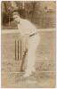 John William Henry Tyler &lsquo;Johnny&rsquo; Douglas. Essex & England 1901-1928. Early sepia real photograph postcard of Douglas, full length at the wicket in batting pose. E. Hawkins & Co. of Brighton. Postally unused. Minor wear to corners, otherwise in very good 