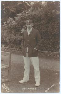 William Nicholas White. Hampshire, Barbados, Army, Combined Services etc. 1903-1922. Early sepia real photograph postcard of White, standing full length wearing blazer and Hampshire cap. Title &lsquo;Capt. N.W. White&rsquo; to lower edge. E. Hawkins & Co., Brighton. 