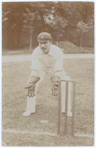 Frederick Henry &lsquo;Fred&rsquo; Huish. Kent 1895-1914. Early sepia real photograph postcard of Huish, full length crouching in wicket-keeping pose at the wicket wearing Kent cap. Foster of Brighton. Postally unused. Very good condition. A nice image.