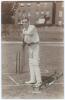 Reginald Trevor Crawford. Leicestershire 1901-1911. Early sepia real photograph postcard of Crawford full length in batting pose at the wicket. Nicely signed in black ink to the photograph by Crawford. Photograph by E. Hawkins & Co. of Brighton. Postally 