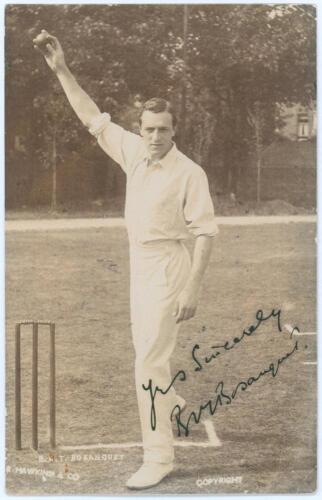 Bernard James Tindal Bosanquet. Middlesex, Oxford University & England 1898-1919. Early sepia real photograph postcard of Bosanquet full length in bowling pose at the wicket. Nicely signed in black ink to the photograph by Bosanquet. Photograph by E. Hawk