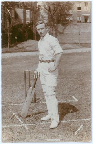 Joseph &lsquo;Joe&rsquo; Hardstaff Snr. Nottinghamshire & England 1902-1924. Early sepia real photograph postcard of Hardstaff full length at the wicket leaning on his bat. E. Hawkins & Co. of Brighton. Postally unused. Very good condition. An excellent image.