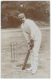 Kumar Shri Ranjitsinhji. Sussex, Cambridge University & England 1893-1920. Early sepia real photograph postcard of Ranji full length at the wicket in batting stance wearing a cap. Foster of Brighton. Title &lsquo;HH The Jam Sahib&rsquo;. Postally unused. Minor wear t