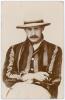 Reginald Erskine &lsquo;Tip&rsquo; Foster. Worcestershire, Oxford University & England 1899-1912. Early sepia real photograph postcard of Foster seated three quarter length on a white background, wearing striped blazer and hat. Foster of Brighton. Postally used, date