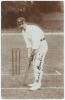 David Denton. Yorkshire & England 1894-1920. Early sepia real photograph postcard of Denton standing full length at the wicket in batting pose wearing a Yorkshire cap. Blind embossed stamp for Foster of Brighton to lower left corner. Very nicely signed to