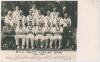 &lsquo;M.C.C. South African Tour 1938-1939&rsquo;. &lsquo;Timeless Test&rsquo; tour. Sepia real photograph postcard of the M.C.C. touring party seated and standing in rows wearing cricket attire. Players include Hammond (Captain), Yardley, Farnes, Ames, Valentine, Edrich, Wright