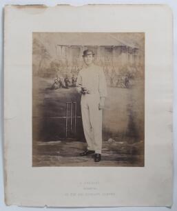 George Frederick Tarrant. Cambridgeshire, North, Players, England etc. 1860-1869. Early large original sepia studio posed photograph of Tarrant in full cricket attire and wearing a hat. The photograph, taken in 1862, shows Tarrant standing in front of a w