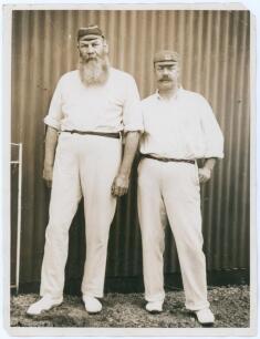 W.G. Grace and Billy Murdoch. Original sepia press photograph c.1904 of Grace (Gloucestershire, London County & England 1865-1908) and Murdoch (New South Wales, Sussex, London County, Australia & England 1875-1904) standing side by side full length wearin
