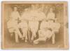 Harrow XI 1884. Early original sepia cabinet card photograph of the Harrow team seated and standing in rows wearing cricket attire and caps. Players&rsquo; names neatly annotated in black ink to verso. Players featured who went on to play first-class cricket ar
