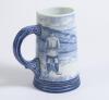 Golf jug. Royal Bonn German golf jug with scenes of a golf match in progress to side with decorative handle 6.25&rdquo; tall with marks to base and number 1378. Good condition - 2