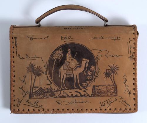 M.C.C. tour to Pakistan 1955/56. Ken Barrington. Surrey & England 1953-1968. Original leather handbag bought by Barrington for his wife Ann from the tour of Pakistan. The leather bag with traditional Indian scenes to sides and to one side signed by sixte