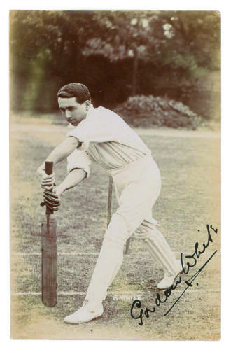 Gordon Charles White, Transvaal & South Africa, 1902-1912. Early sepia real photograph postcard of White, full length, stood at the wicket in batting pose. Nicely signed by White in black ink. Foster of Brighton. Postally unused. Good/very good condition