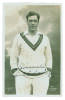 Frank Edward Woolley. Kent & England 1906-1938. Sepia real photograph postcard of Woolley, three quarter length wearing cricket attire. Nicely signed in black ink &lsquo;yours sincerely&rsquo; by Woolley. B.C. Flemons, Tonbridge. Bump to top right hand corner of the 