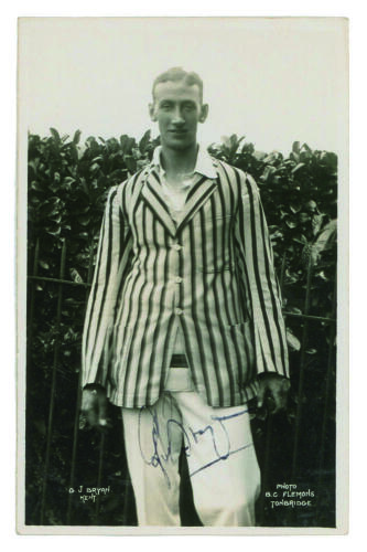 Godfrey James Bryan. Kent 1920-1935. Mono real photograph postcard of Bryan, three quarter length, wearing striped blazer. Signed in black ink by Bryan. B.C. Flemons, Tonbridge. Good condition