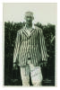 Godfrey James Bryan. Kent 1920-1935. Mono real photograph postcard of Bryan, three quarter length, wearing striped blazer. Signed in black ink by Bryan. B.C. Flemons, Tonbridge. Good condition