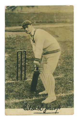 Gilbert Laird Jessop, Gloucestershire & England 1894-1914. Mono printed photograph postcard of Jessop, full length, in batting pose in front of the wicket wearing cap. Very nicely signed to lower border in black ink by Jessop. Rotophot 8758. Some wear to 