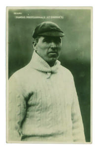 George Geary. Leicestershire & England 1912-1938. Mono real photograph advertising postcard entitled &lsquo;Famous Professionals at Gamage&rsquo;s&rsquo; showing Geary half length, wearing sweater and Leicestershire cap. Signed to verso by Geary, Tyldesley, Fred Root and G