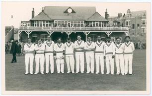 India tour to England 1952. Original mono real photograph plain back postcard of the India team lined up in one row wearing cricket attire in front of the pavilion for the tour match at Scarborough v T.N. Pearce&rsquo;s XI, 10th- 12th September 1952. Players in