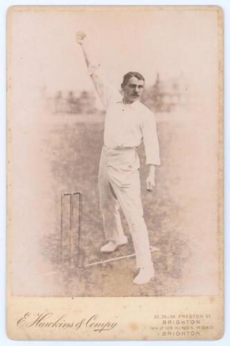 John Thomas &lsquo;Jack&rsquo; Hearne. Middlesex & England 1888-1923. Original sepia cabinet card photograph of Hearne in bowling pose at the wicket with photographer&rsquo;s name printed to lower border. Photograph by E. Hawkins of Brighton. Advertisement for E. Hawkins t