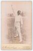 John Thomas &lsquo;Jack&rsquo; Hearne. Middlesex & England 1888-1923. Original sepia cabinet card photograph of Hearne in bowling pose at the wicket with photographer&rsquo;s name printed to lower border. Photograph by E. Hawkins of Brighton. Advertisement for E. Hawkins t