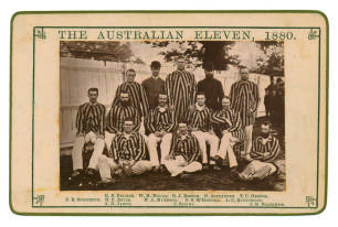 &lsquo;The Australian Eleven 1880&rsquo;. Sepia cabinet card photograph of the touring team to England, seated and standing in rows wearing tour blazers, with printed title above and players&rsquo; names below, black border surround, gilt to card edges. Players include Mur