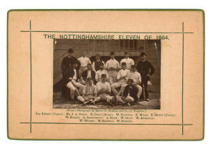 &lsquo;The Nottinghamshire Eleven of 1884&rsquo;. Sepia cabinet card photograph of the county team, seated and standing in rows, with printed title above and players&rsquo; names below, black border surround, gilt to card edges. Players include Shaw, Gunn, Shrewsbury, Atte